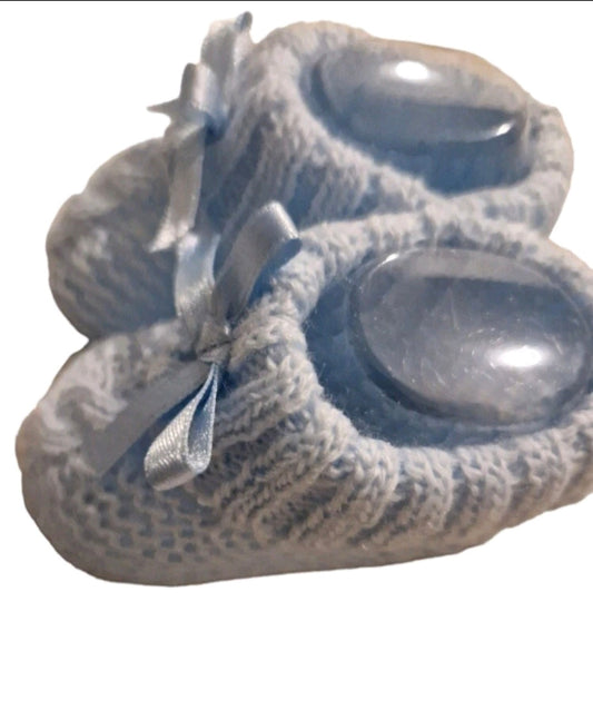 Decorative paw prints with a bow on a white background