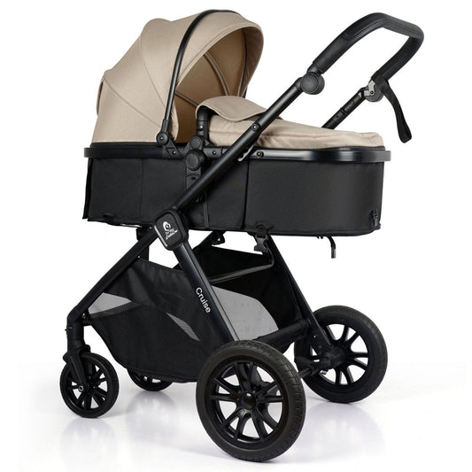 Black and beige baby stroller on a white background