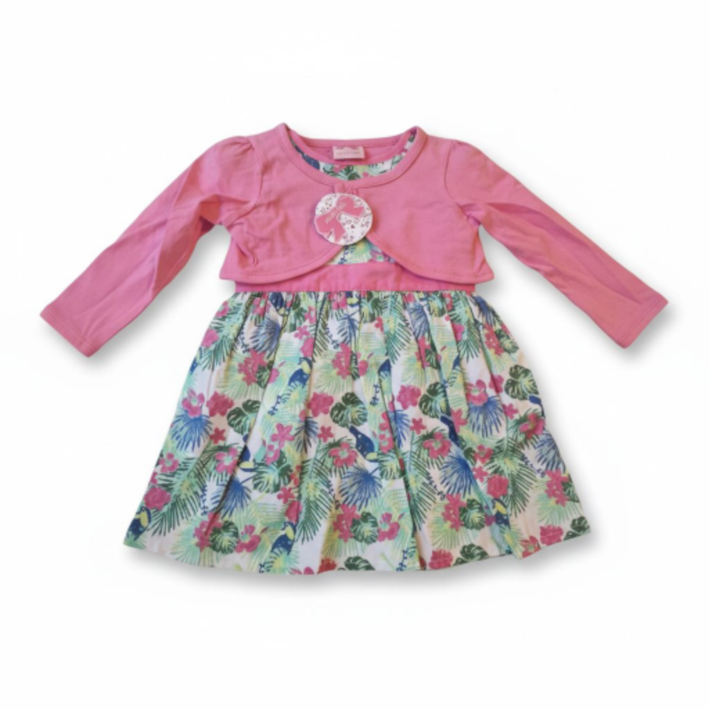 Children's outfit with pink long-sleeve top and floral skirt on a white background
