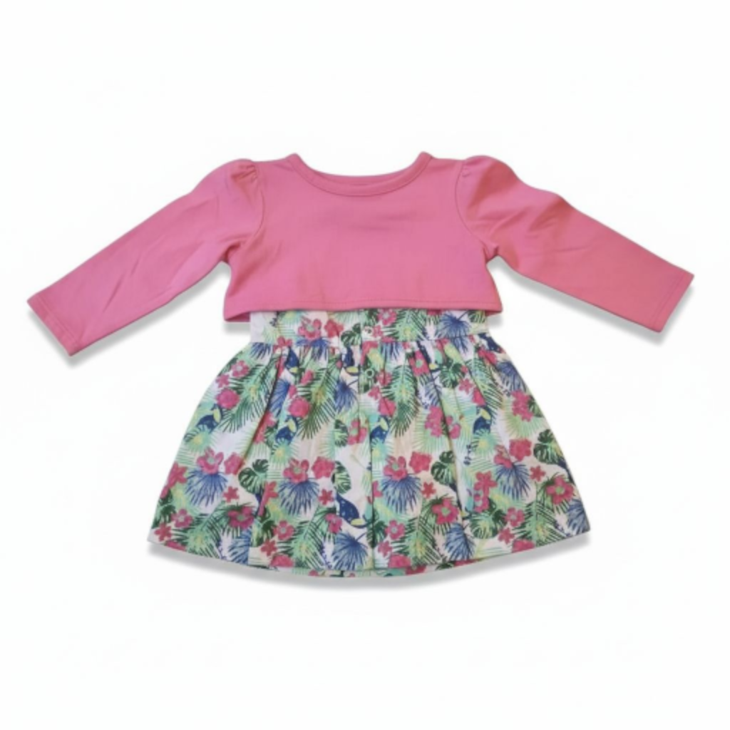 Pink long-sleeve top with a floral skirt on a white background