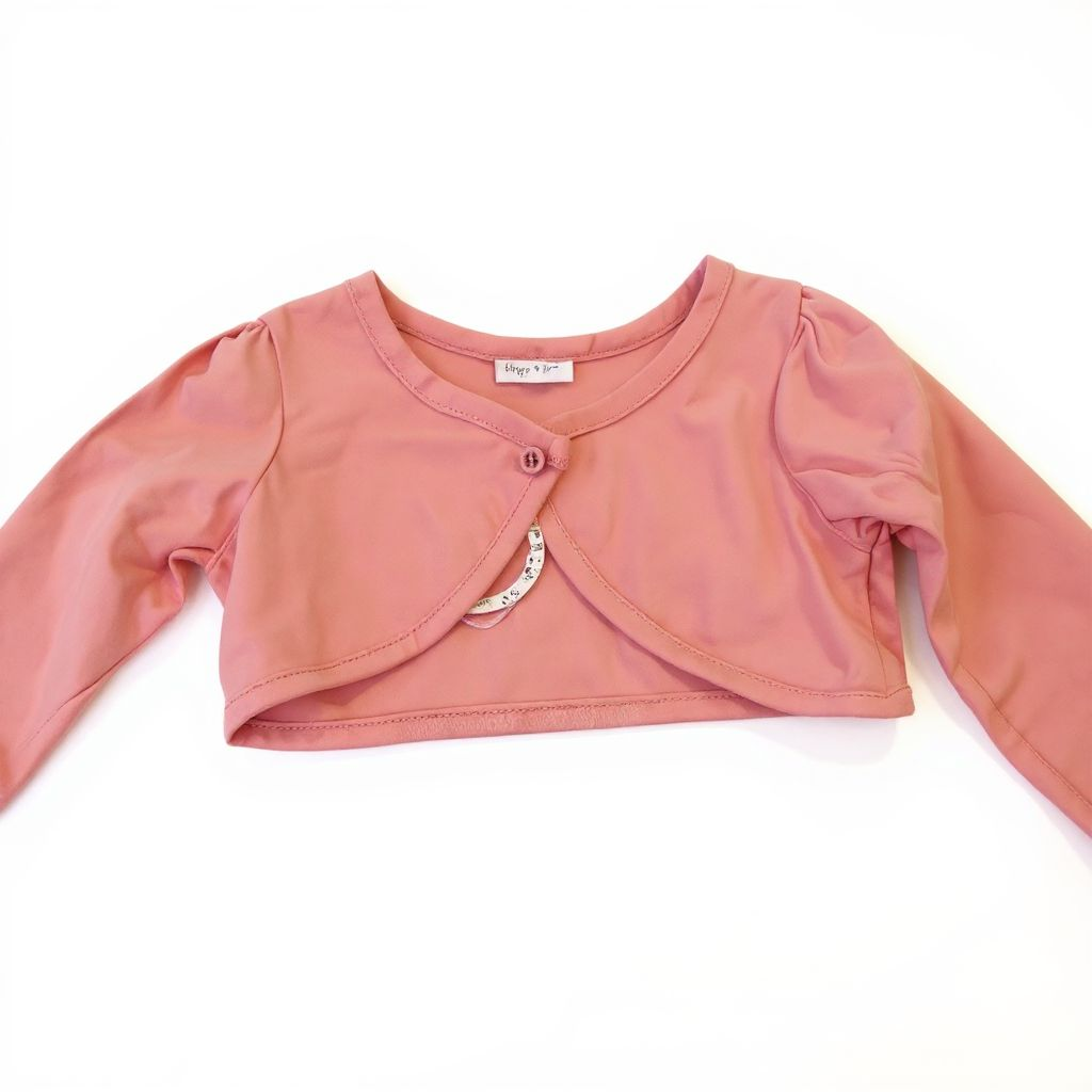Pink long-sleeve crop top on a white background