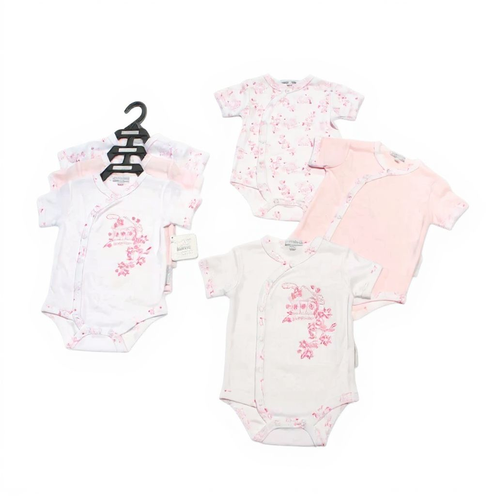 Set of baby bodysuits with floral pattern on a white background
