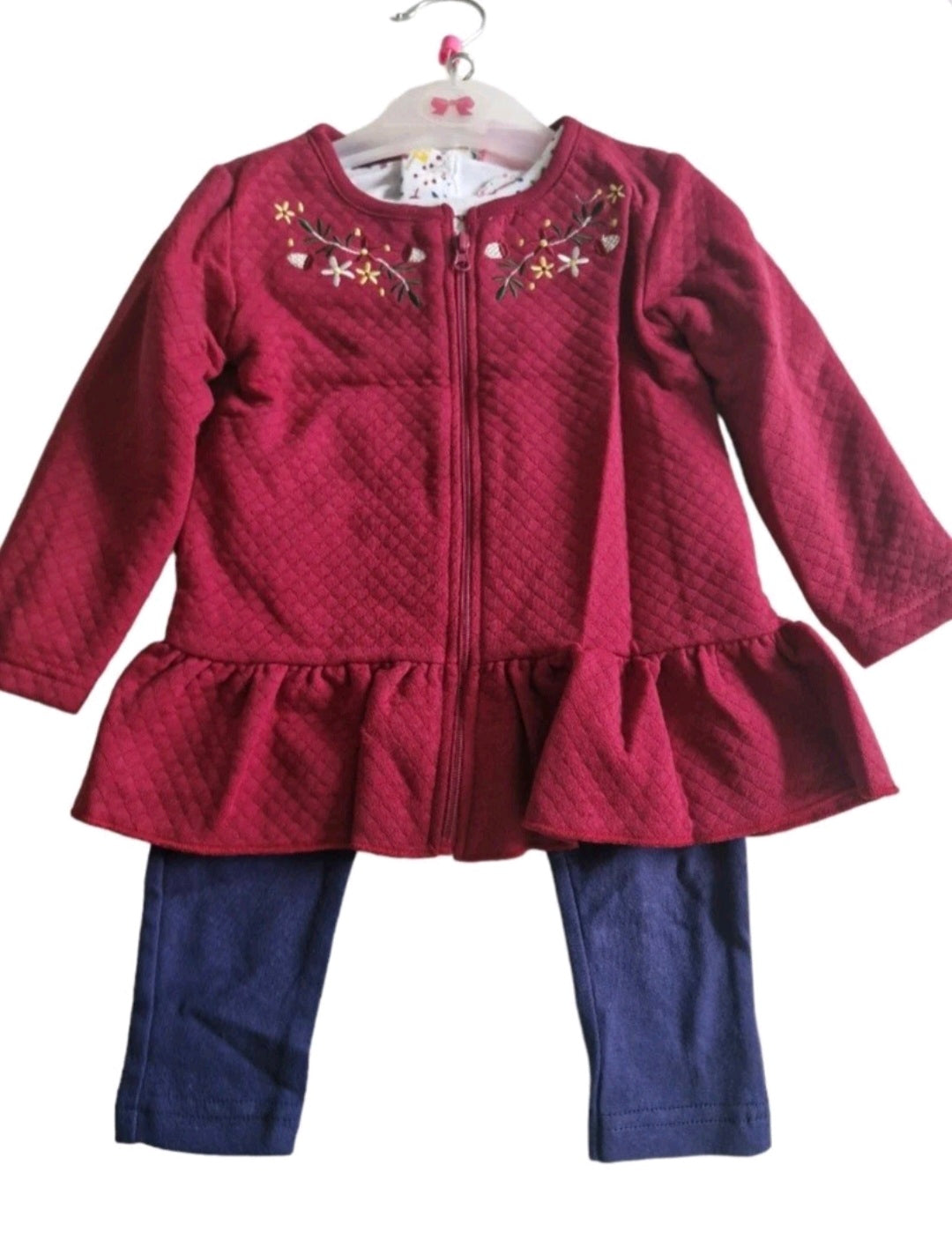 Children's outfit with red jacket and blue pants on a white background