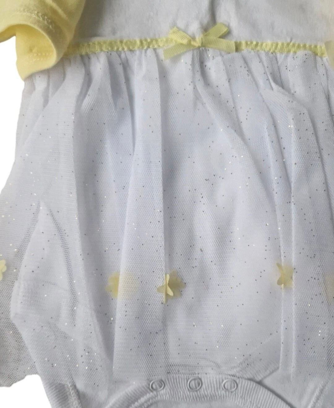 Baby outfit with gray pants and yellow top, featuring a bow detail.