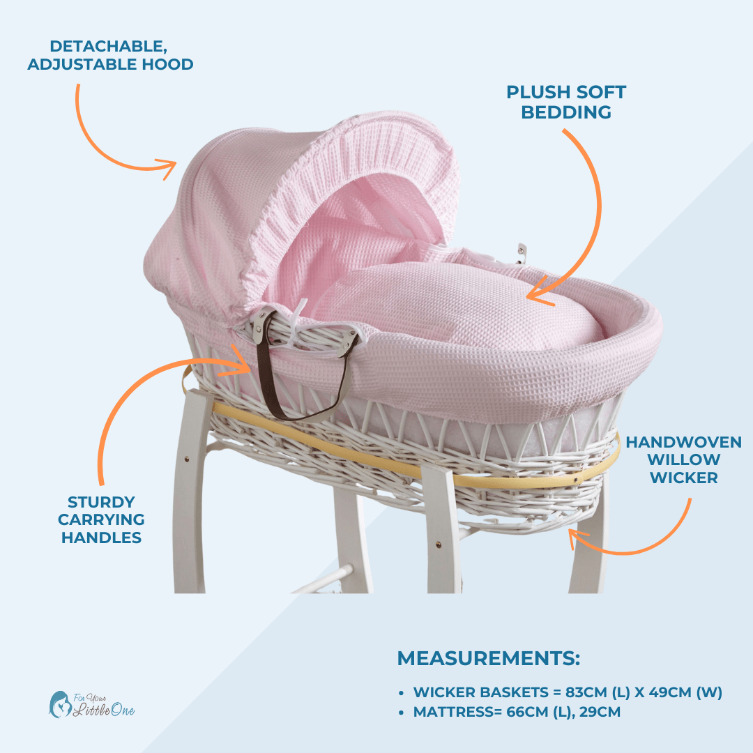 Pink wicker baby basket with features highlighted on a light blue background