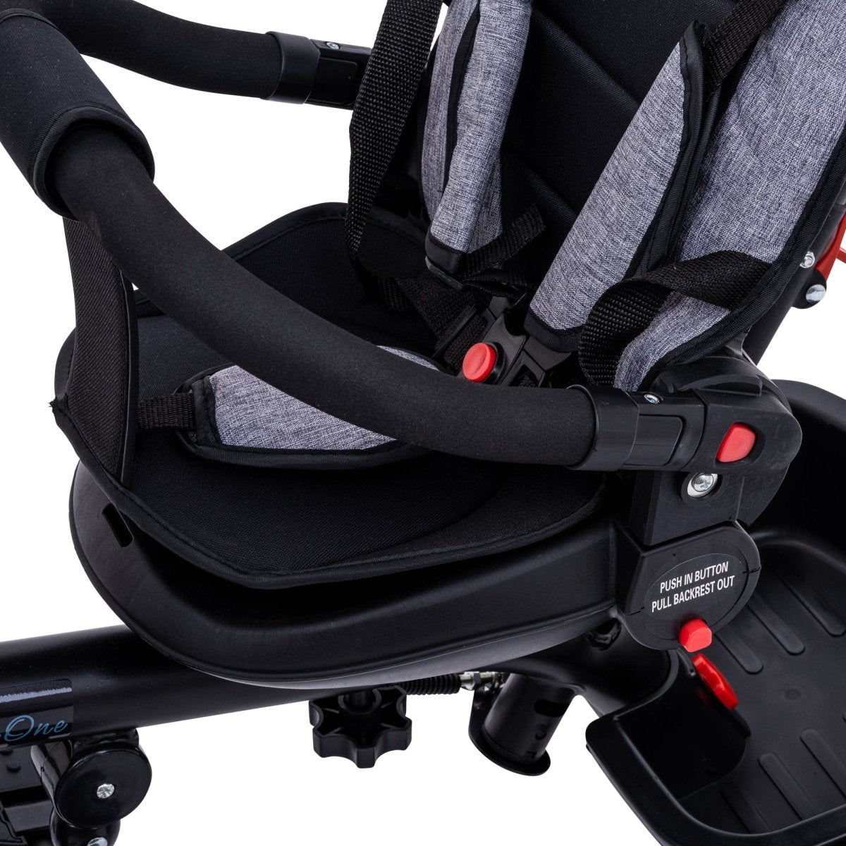 Close-up of a baby car seat with straps on a white background