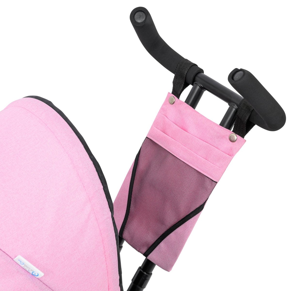 Pink stroller organizer with mesh pocket attached to a stroller handle on a white background
