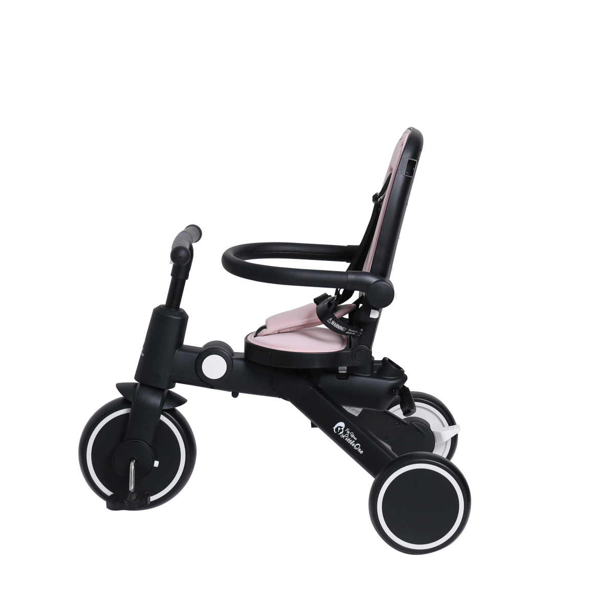 Black and pink baby tricycle on a white background