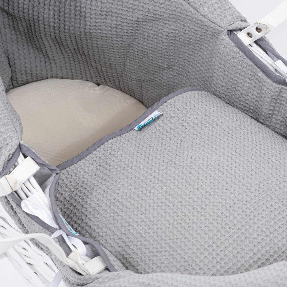 Gray textured fabric with a zipper on a white background